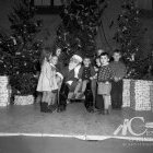 Le Père Noël dans son royaume.</br>1954. - Fonds Studio Lumière, CH116.